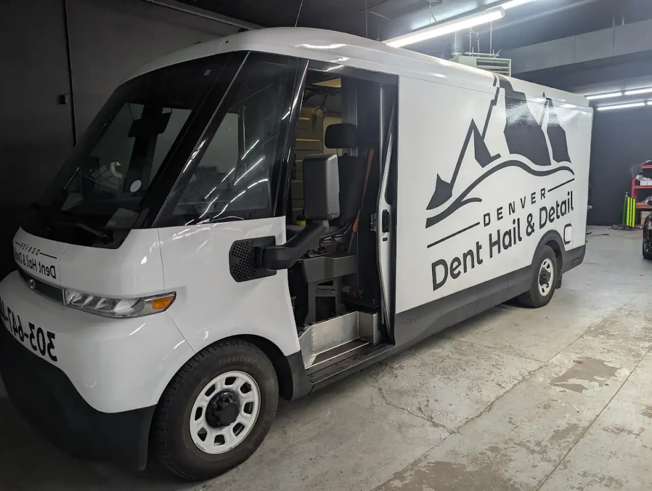 Dent, Hail & Detail branded mobile detailing van at our Denver shop